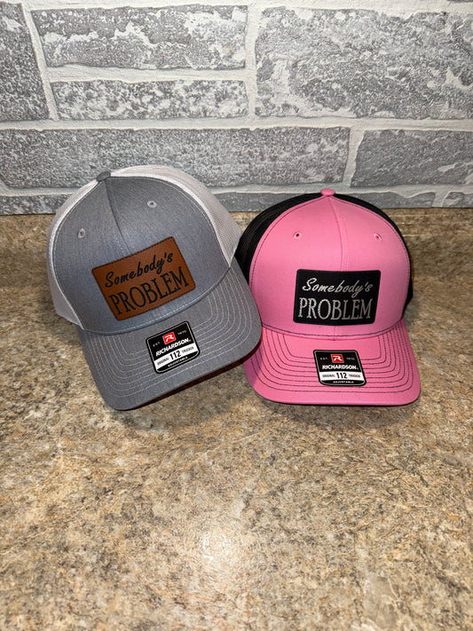 Somebody’s problem SnapBack Hat